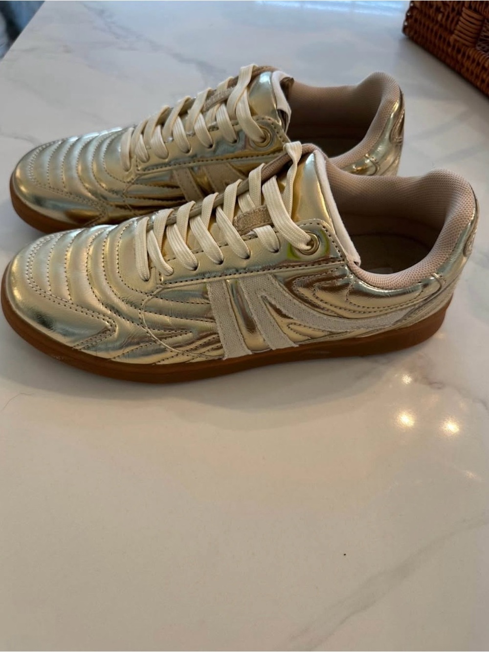 Ladies Steve Madden Gold metallic Madrid sneakers. Worn once